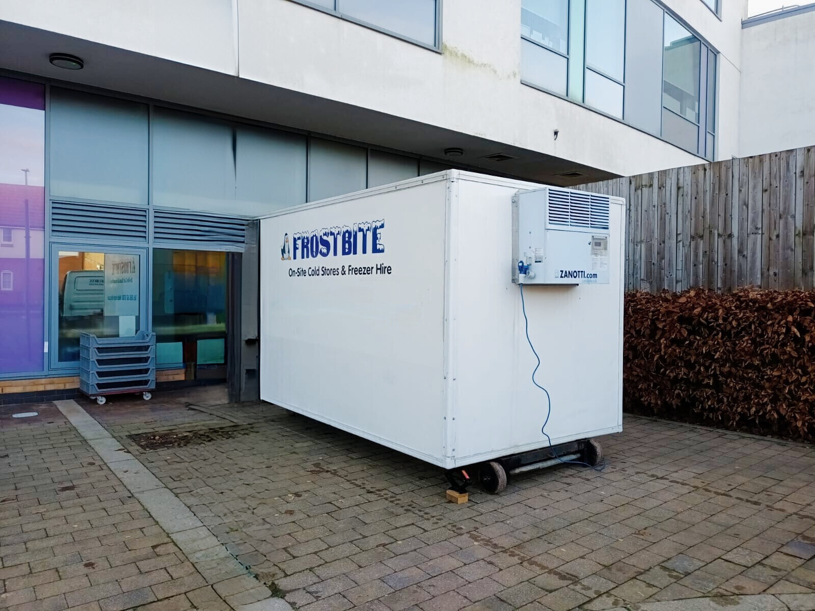 Commercial freezer trailer hire at a high school in Oldham for emergency kitchen cold storage.