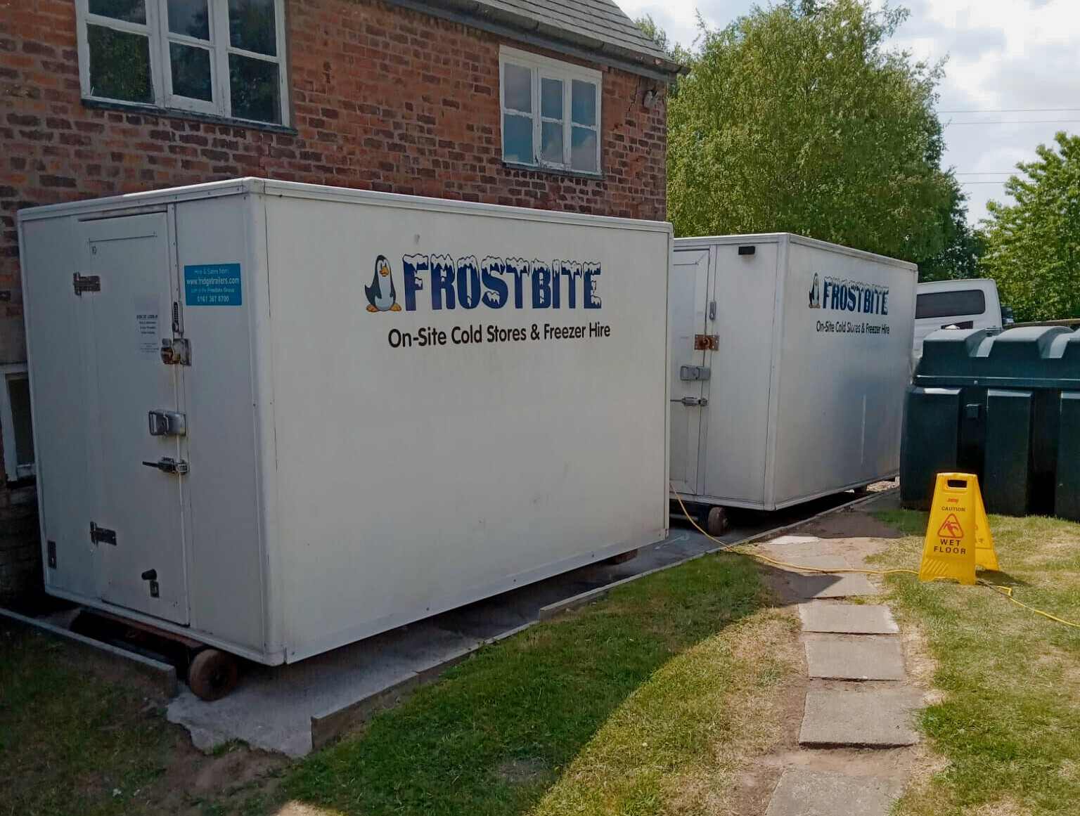 Emergency refrigeration hire trailer being delivered to a North West business at night