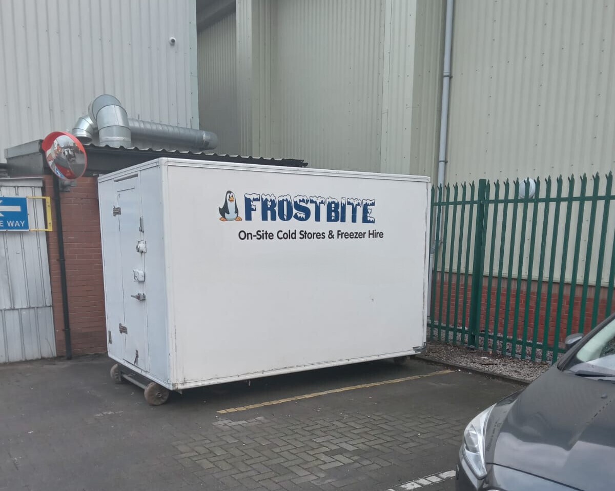 Frostbite Refrigeration trailer at a large industrial warehouse loading bay in the North West