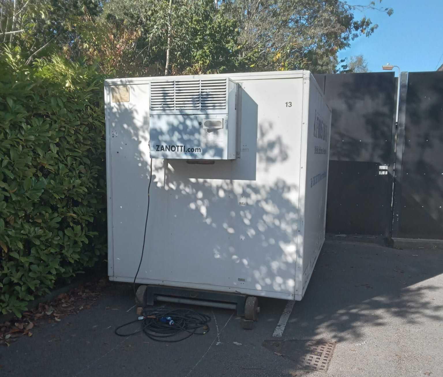 White Frostbite Refrigeration trailer parked next to a large event marquee in the North West