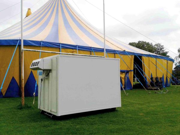 A Frostbite Refrigeration trailer parked backstage at a major North West outdoor festival to support food traders.