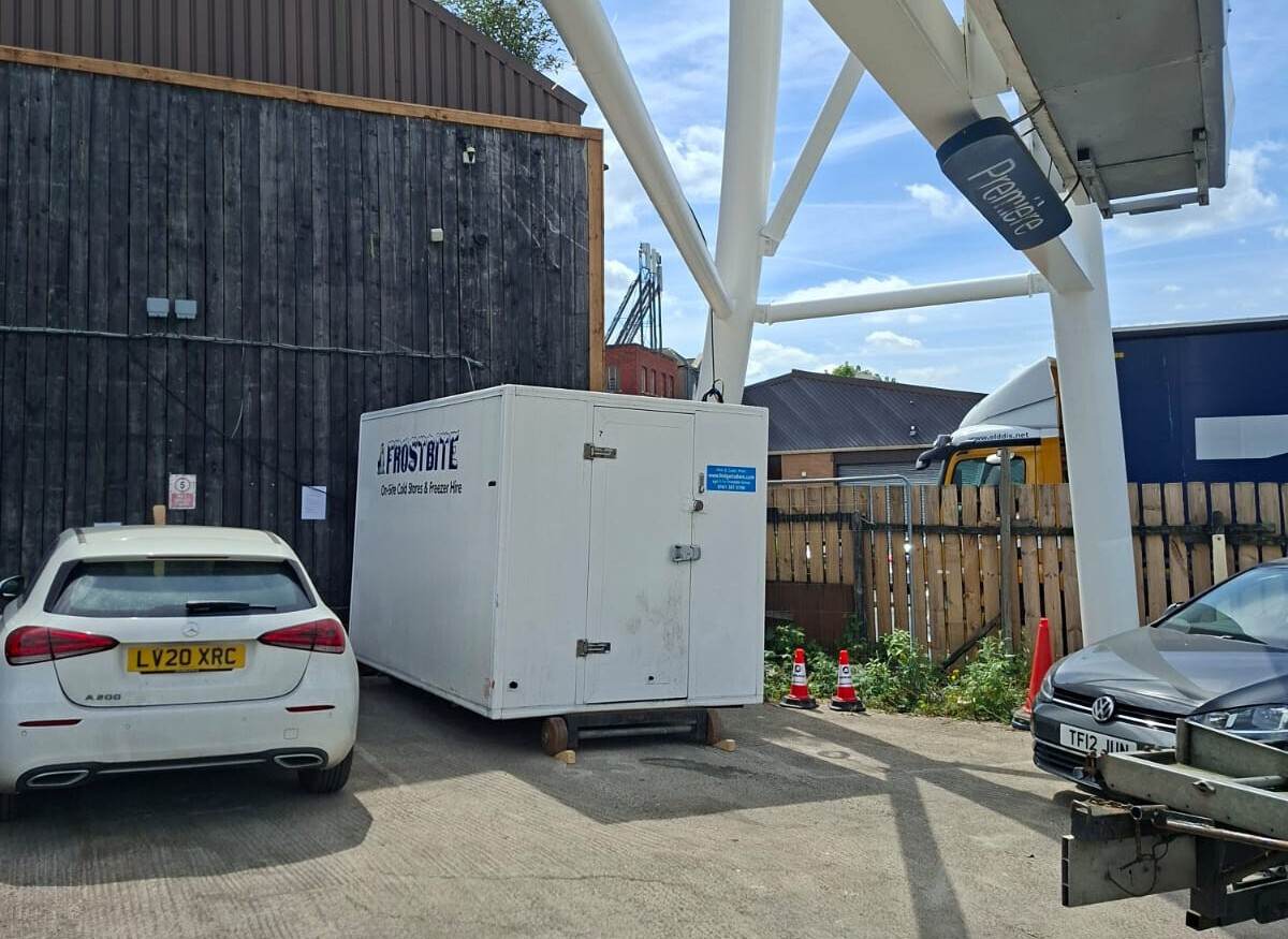 Retail fridge trailer hire parked at a North West supermarket loading bay