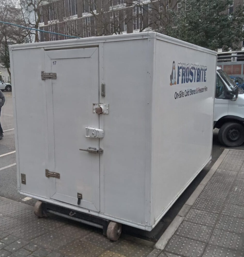 Frostbite Refrigeration trailer parked at a North West university campus building