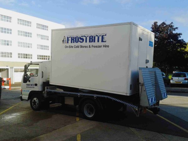 A Frostbite Refrigeration emergency freezer trailer being delivered to a North West commercial kitchen during a breakdown.